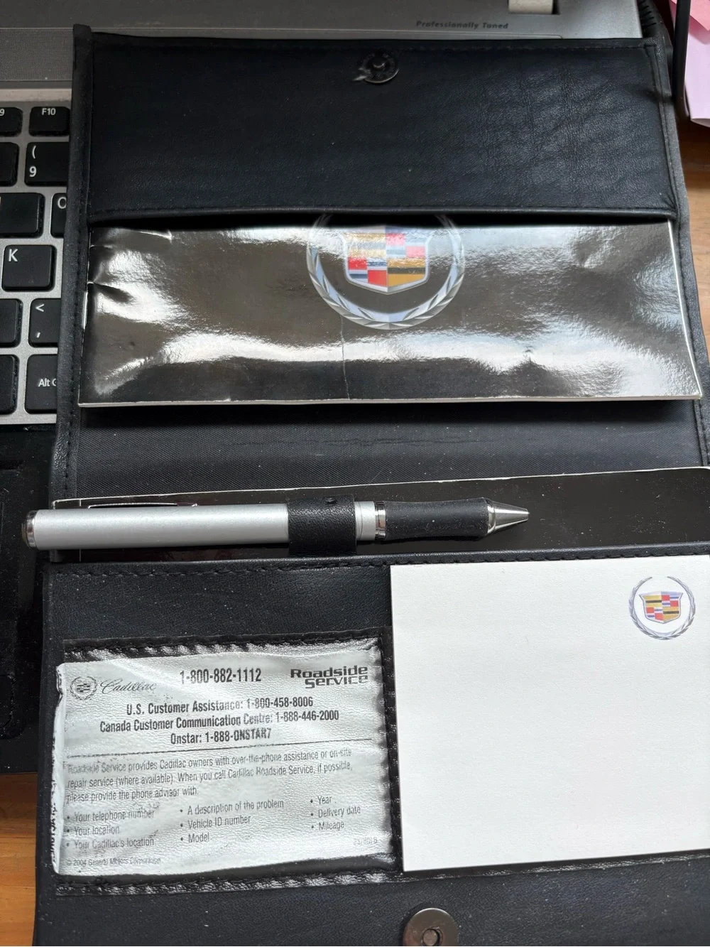 Cadillac 2005 CTS Embossed Leather Document Folio with Cadillac owners Manuals